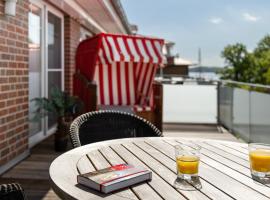 Ferienwohnungen Hafenresidenz Alter Speicher Lauterbach，普特布斯的飯店