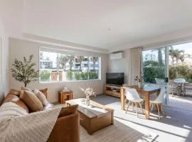 Sunny Courtyard Dreaming Downtown with Pool & Gym