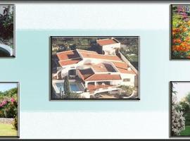 Genies Villa Boutique Algarve, casă de vacanță din Almancil