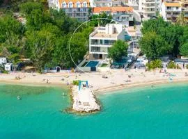 Beachfront Villa Erce with private 40sqm heated pool, a Gym, 7 en-suite bedrooms, a rooftop terrace, 2 living areas