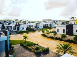 Oasis Eden Villa, hotel com estacionamento em Kupuis