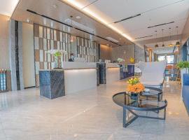 Echarm Hotel Zigong Machishui Wanda Plaza, hotel v destinácii Zigong