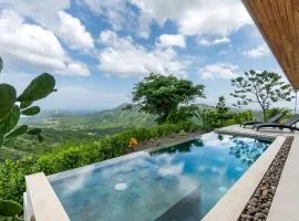 Mountainside Home with Modern Design Sweeping Ocean Views & Private Swimming Pool