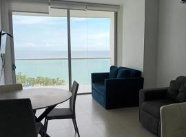 Edificio Sierra Beach Resort Pozos Colorados vista y salida al mar, hotel en Santa Marta