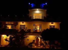 Lotus Garden Guest House, отель в Ауровиле