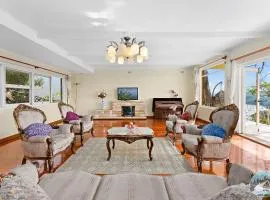 Spacious 4-Bed Home Water Views in Castle Cove