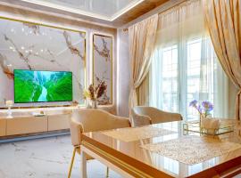 Тематични апартаменти Дубай и Малдиви, hotel in Néa Péramos