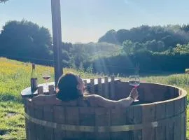 Glamping with outdoor wood-fired hot tub