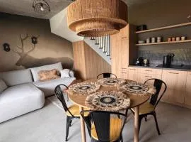 Siedlisko na wydmach, w cenie sauna,podgrzewane jacuzzi,domki klimatyzowane,starlink internet,parking