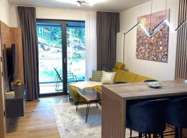 Apartman Yellow Bjelasnica, hotel met parkeren in Bjela&scaron;nica