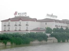 Magnotel Business Yixing Passenger Station Tuanjiu Scenic Area, hotel v destinaci Yixing