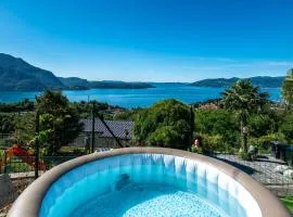 Casa 24 - Trilocale con Vista Lago, Giardino e Idromassaggio Gonfiabile