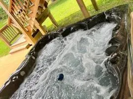 Wooded Retreat with game area and hot tub