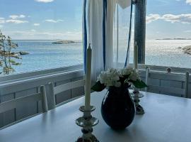 Family Cabin By The Sea With Private Pier, hotel in Ula