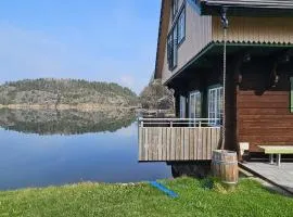 Log cabin with pool, sauna and boat by Torreby Castle
