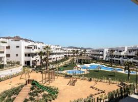 Apartamento encantador con piscina comunitaria en San Juan de los Terreros - ES-376-17, hôtel à Pulpí