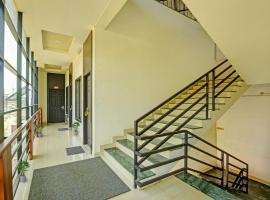Hotel O Omassery Open stay, hotel v destinaci Tāzhekkod