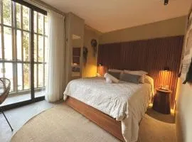 Estudio Nuevo a 7 min de playa, GYM, 2 albercas, Coworking, cerca de Plaza Central