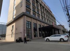 Echarm Hotel Jingjiang Bus Passenger Station Fanggu Street, hotel v destinaci Jingjiang