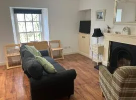 Berryhill Maids Quarters - 1 bedroom - Self Catering - Sleeps 1 or a couple - Dogs Welcome - Off-road Parking - Suit Contractors - Peterhead 1 mile - Newly Refurbished - Open plan kitchen -living - dining - 1 bathroom - Shed - Yard -Drying Room available