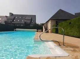 Family T2 with pool and garden in Touques