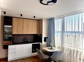 1BR Luxury apartment with sea view and parking space