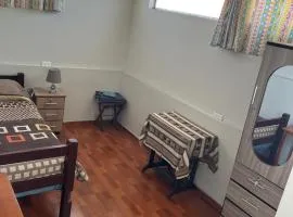 Hab Simple baño compartido Estudiante o Voluntario terraza vista a los Volcanes