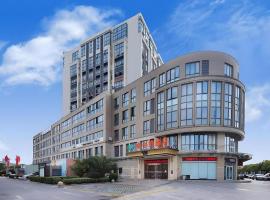 Vienna Hotel Jinjiang Bus Passenger Station, hotel v destinaci Jingjiang