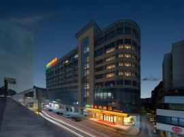 Vienna Hotel Guangdong Zhaoqing Sihui Center Jade Expo Market, hotel v destinaci Čao-čching