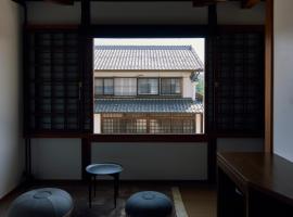 Travel Stop UNNOWA, hotel in Tomi