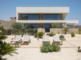 Cala Theresìa - Exclusive sea front apartments, ξενοδοχείο σε Granelli