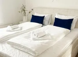 Ferienwohnung mit Meerblick und Terrasse - Nur 50 Meter zum Strand - inklusive eigenem Parkplatz und Fahrradunterstellplatz