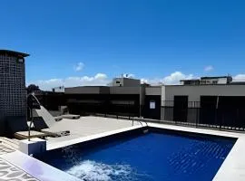 Lindo Flat a poucos passos da praia