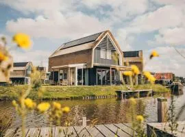 Watervilla buitenzijde met Sauna I 8 personen - Boutique Parc Pharshoeke