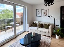 Moderne Ruheoase mit Balkon