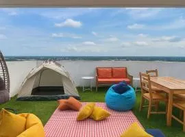 2BR The Chill Loft by The Bali Corner at Azure North Penthouse Big Balcony, Pool amenities and Mount Arayat View