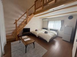 Amami में Guesthouseあいみ, बीच होटल