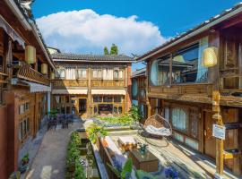 Lijiang Cotton Qiqi Boutique Inn, hotel v destinaci Li-ťiang