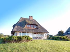 Reetdachhaus mit direktem Meerblick, ξενοδοχείο σε Südstrand