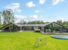 Holiday Home Matild - 400m from the sea by Interhome, khách sạn có bồn jacuzzi ở Marielyst