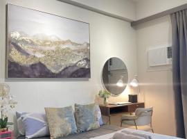 The Suite Room at The Amani Grand, ubytov&aacute;n&iacute; s možnost&iacute; vlastn&iacute;ho stravov&aacute;n&iacute; v destinaci Mactan Cebu International