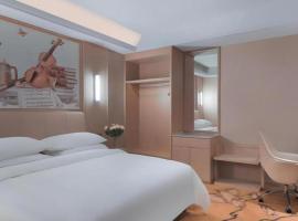 Vienna Hotel Zhejiang Tongxiang Puyuan、Puyuanのホテル