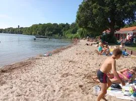 Seeblick Apartment neben der Schwimmhalle, gratis Räder, Tierfreundlich