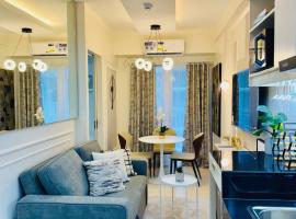 Stylish Condo Room in Iloilo City with Shared Pool，位于伊洛伊洛的酒店