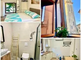 Studio Marin in front of the highest bell tower in Istria