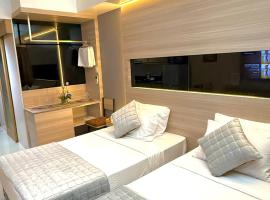 Aiza's Place with Two Beds in Shell Residences PASAY near MOA and NAIA, aparthotel v destinaci Manila