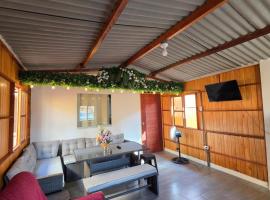 Acogedora casa de madera, בקתה בפימנטל