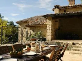 restored water mill with rockpools and waterfall