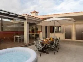 Beach Villa with Jacuzzi & Garage by HostWise