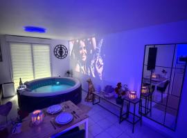 Suite Eden Spa, Appart'hôtel bien être , Patio de standing barbecue - TV XL CinéSport, Lit Q-Size, Wifi, P-Gratuit en Résidence, serviced apartment in Avion